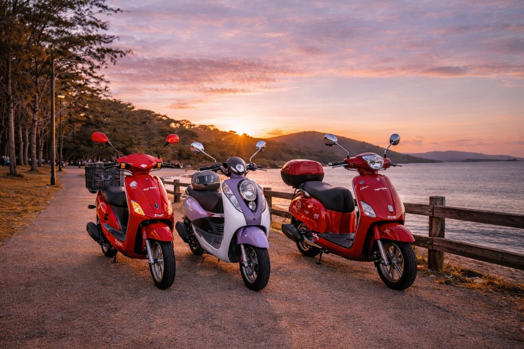Three scooters at sunset on Airlie Beach
